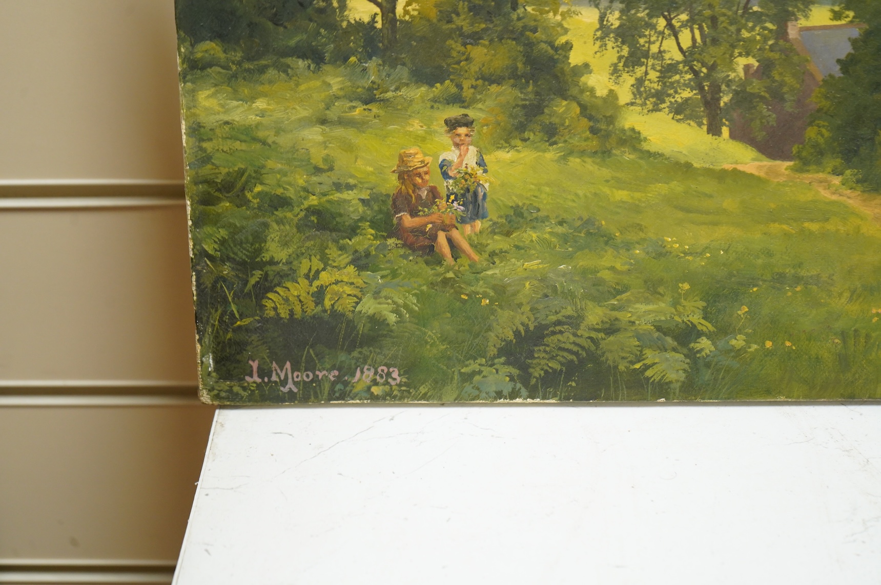 J. Moore, Two children on a hillside, signed and dated 1883, oil on canvas, together with a similar example, Riverscape with mountains beyond, pair of oils on canvas, unframed, each 50 x 40cm